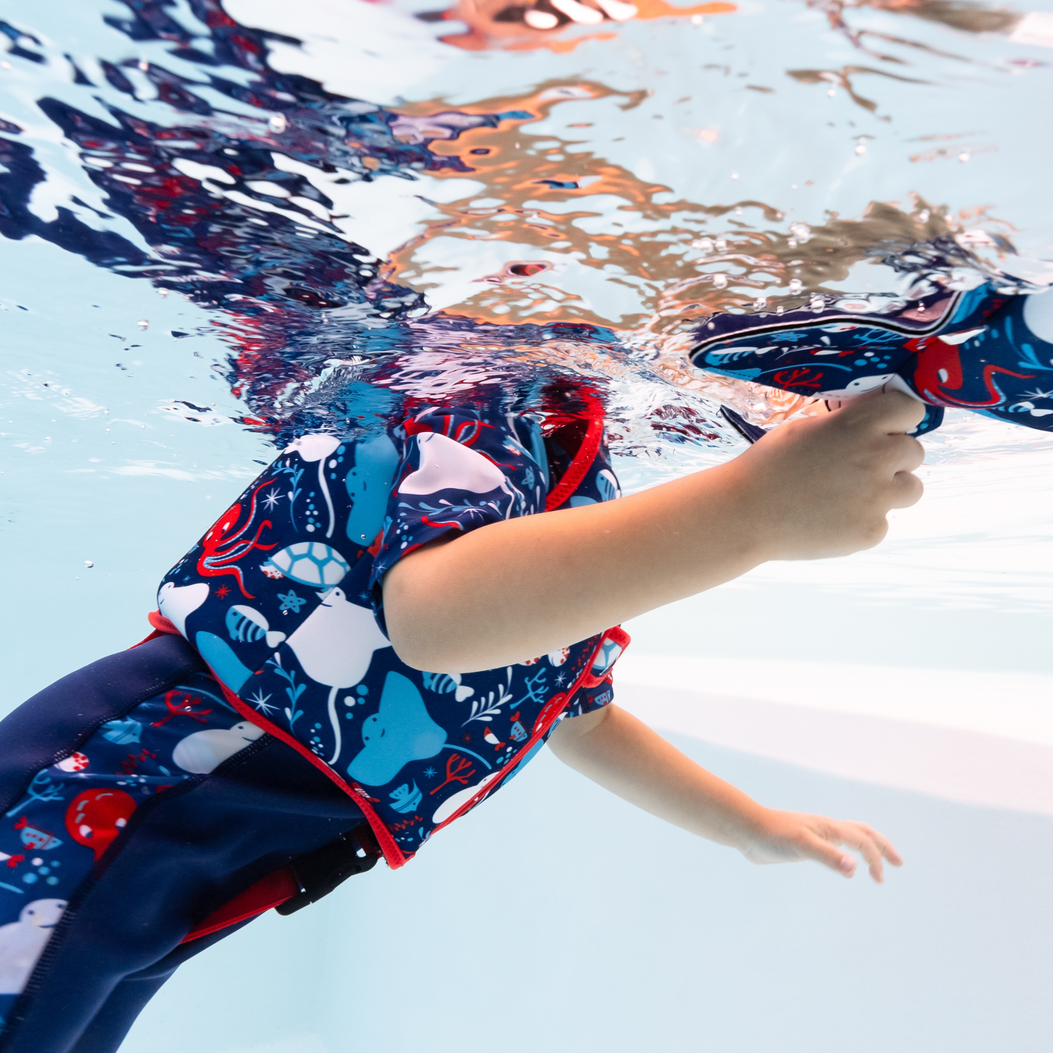 Paquete de traje de neopreno UV Sun & Sea y chaleco de natación Go Splash