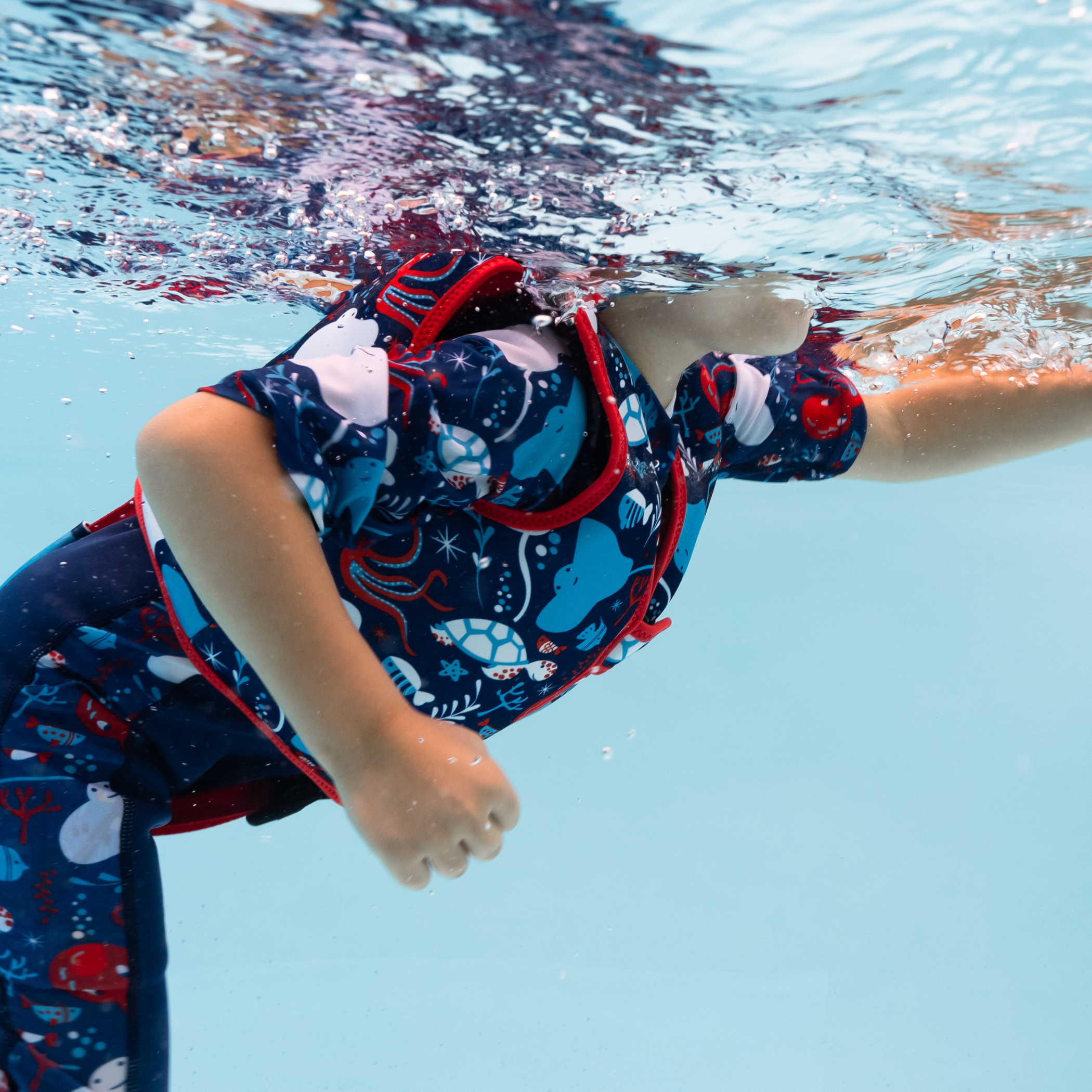 Paquete de traje de neopreno UV Sun & Sea y chaleco de natación Go Splash